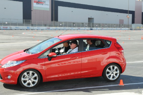 Bob Bondurant instructors take SEMA participants around SEMA MotorTrend Pro