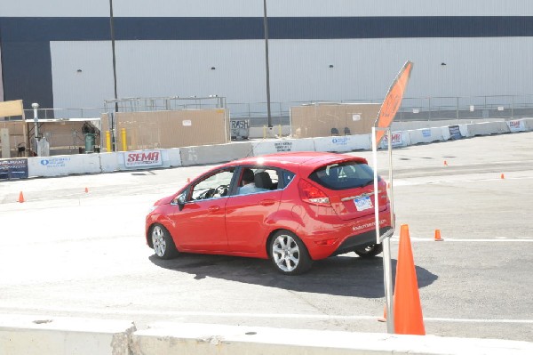 Bob Bondurant instructors take SEMA participants around SEMA MotorTrend Pro